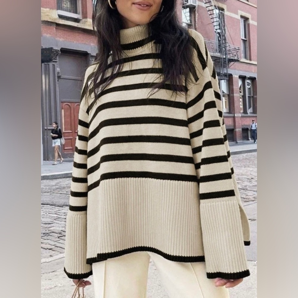 Black and white striped turtleneck sweater. Women’s small. Oversized fit.